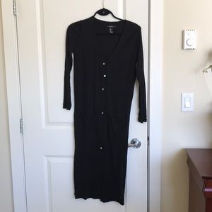 Long black sweater with front pockets